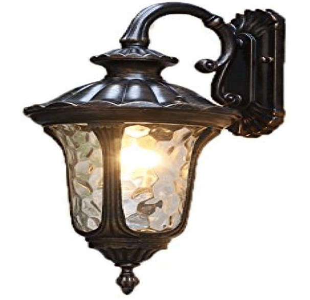 A pendant light with a geometric design, blending metal and glass elements, casts warm, diffused light, creating a captivating focal point and elevating the room's aesthetic.